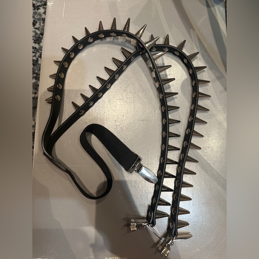 Alessandro runway collection spiked suspenders.